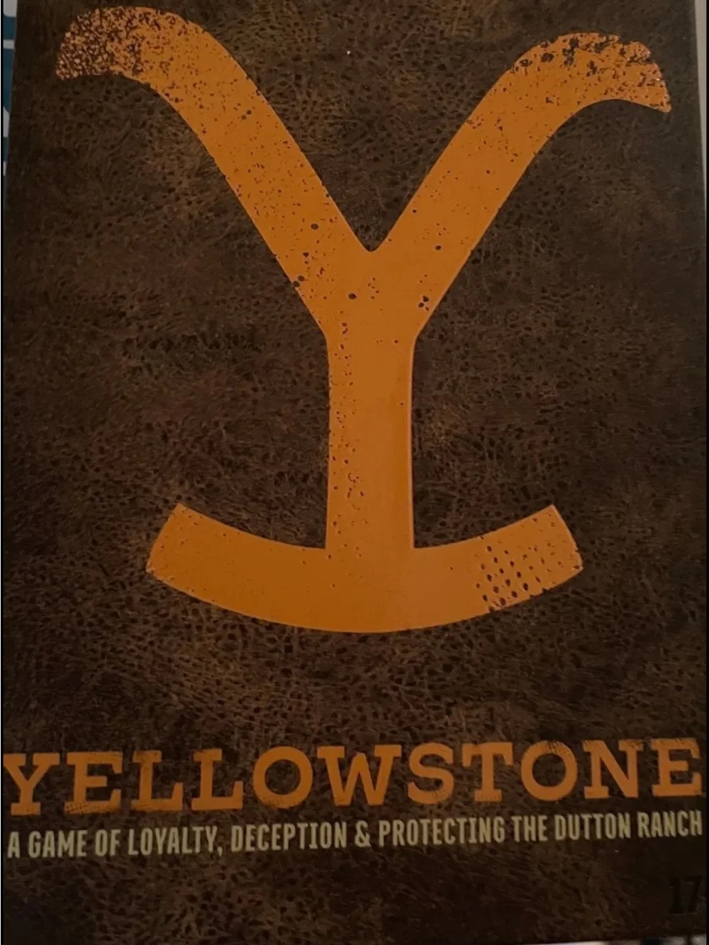 Yellowstone Board Game - Bold Yellow Logo on Brown